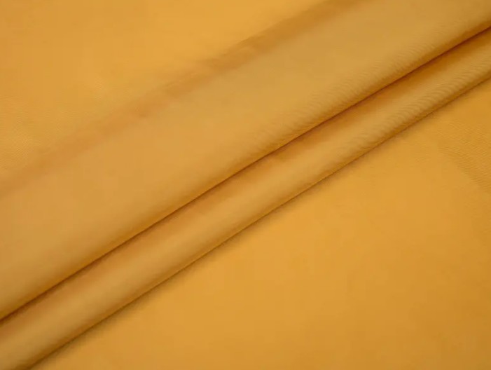 Tkanina z podszewki poliestrowej poprawia komfort i trwałość kombinezonów wysokiej klasy